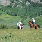 JON AND KAREN ENJOYING A BEAUTIFUL DAY AT THE RANCH....